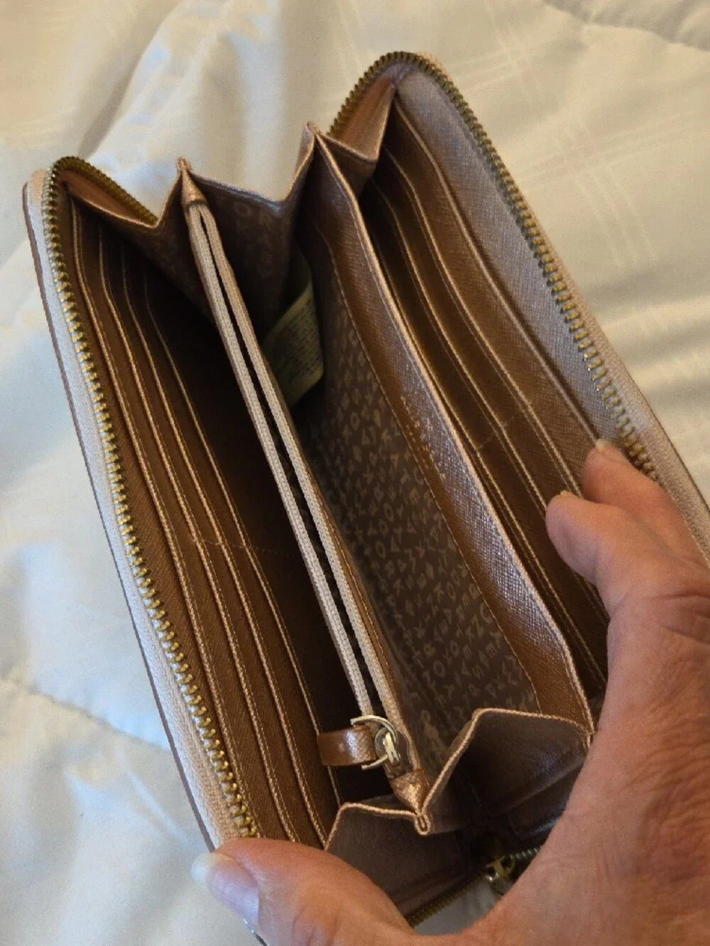 kate spade metallic rose gold zip-around wallet
